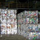 Bales of paper, plastic and cardboard stand ready to be shipped out from the San Francisco Recycling Center.