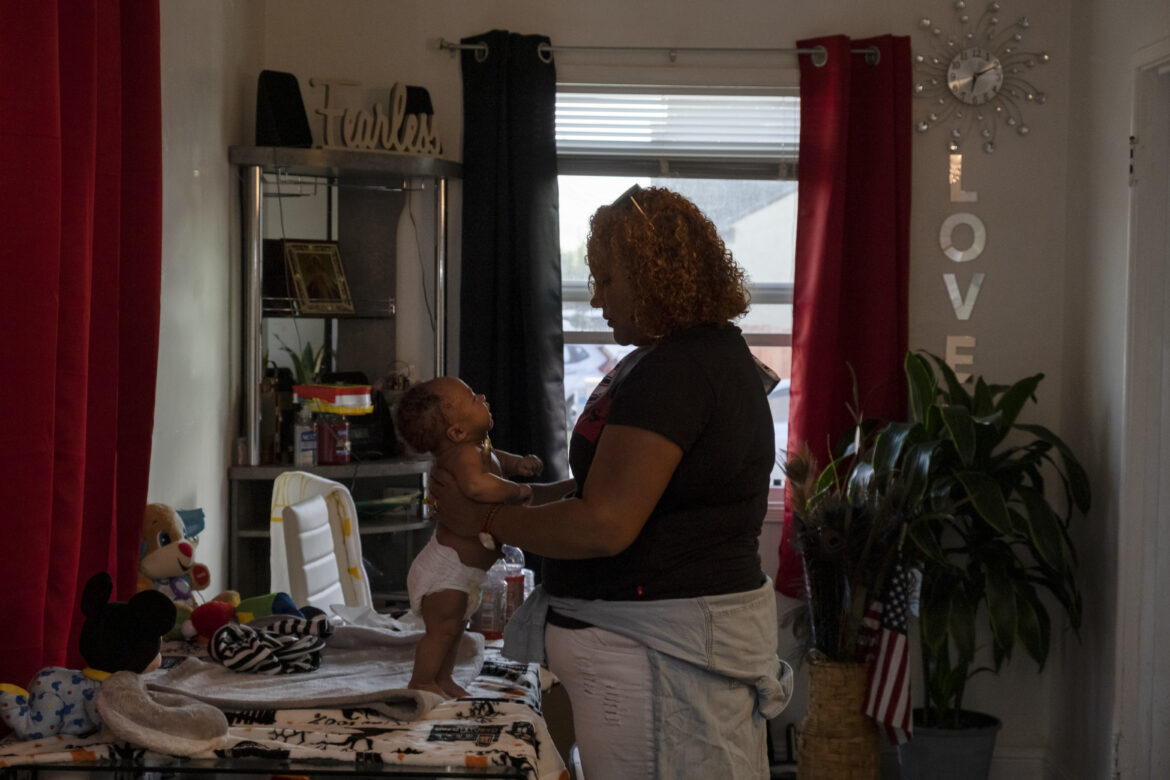 Tantay Tolbert changes her son’s clothes on the dining room table in her new apartment. In March, the Homeless Prenatal Program in San Francisco offered her a hotel room for 90 days, and this became her first step into stable housing. After the hotel room, she transitioned into subsidized housing. “They looked out for me during the time of my pregnancy,” Tolbert said. “They gave us vouchers and made sure we had something to eat. It was catered food every day. It was blessed.” On June 16, Hamilton Families gave Tolbert the keys to her new apartment. “On Tupac’s birthday. It’s a Black holiday,” she said. A time to celebrate.