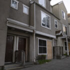 Several street-level apartments, some boarded up, are shown. San Francisco officials have agreed to loan the developer and property manager of the Plaza East housing complex $2.7 million for repairs.