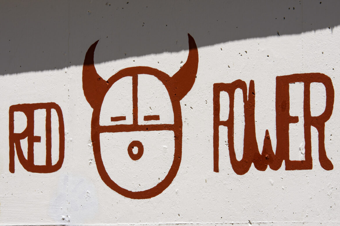 A close-up view to the “Red Power” political graffiti near Building 61.