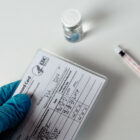 A COVID-19 vaccination card at a medical clinic.