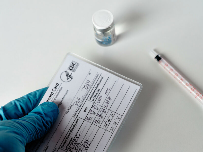 A COVID-19 vaccination card at a medical clinic.