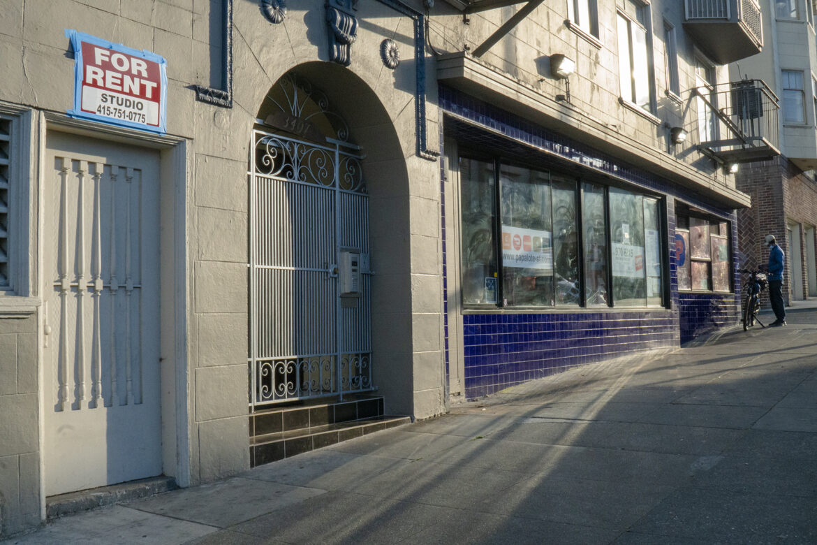 A "For Rent" sign is taped above a doorway in San Francisco's Mission District, next to a retailer. San Franciscans in need of rent relief could get a reprieve if a law proposed March 24 passes -- but only if they act fast.