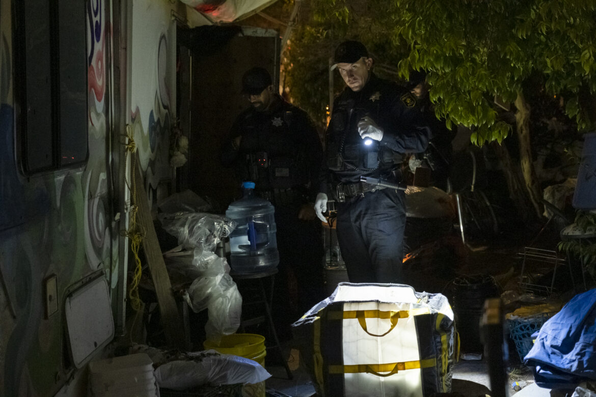 To initiate a massive encampment sweep at Eight and Harrison streets, Berkeley police and city staff began rousting people living in tents and vehicles shortly after 6 a.m. on Oct. 4.