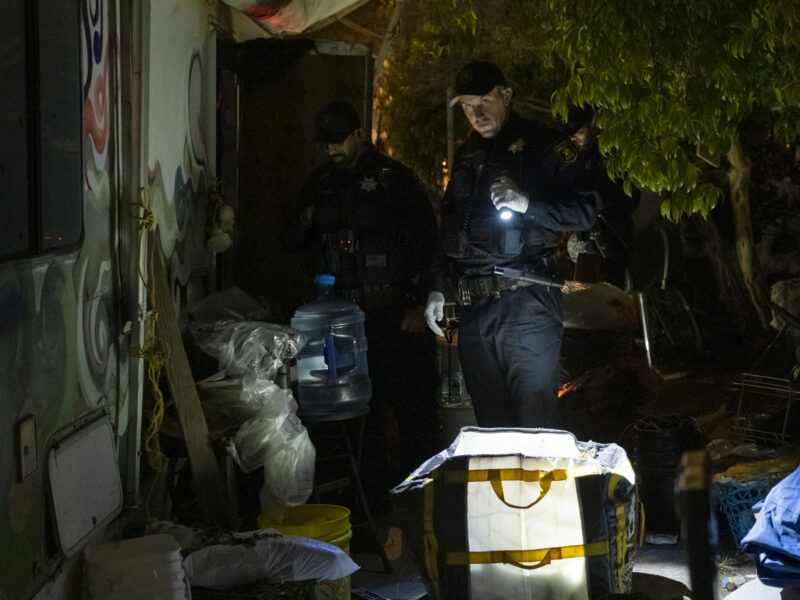 To initiate a massive encampment sweep at Eight and Harrison streets, Berkeley police and city staff began rousting people living in tents and vehicles shortly after 6 a.m. on Oct. 4.