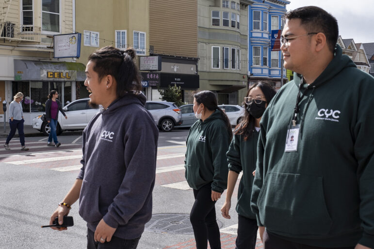 Henry Ha and other outreach team members visit the Richmond District in San Francisco.