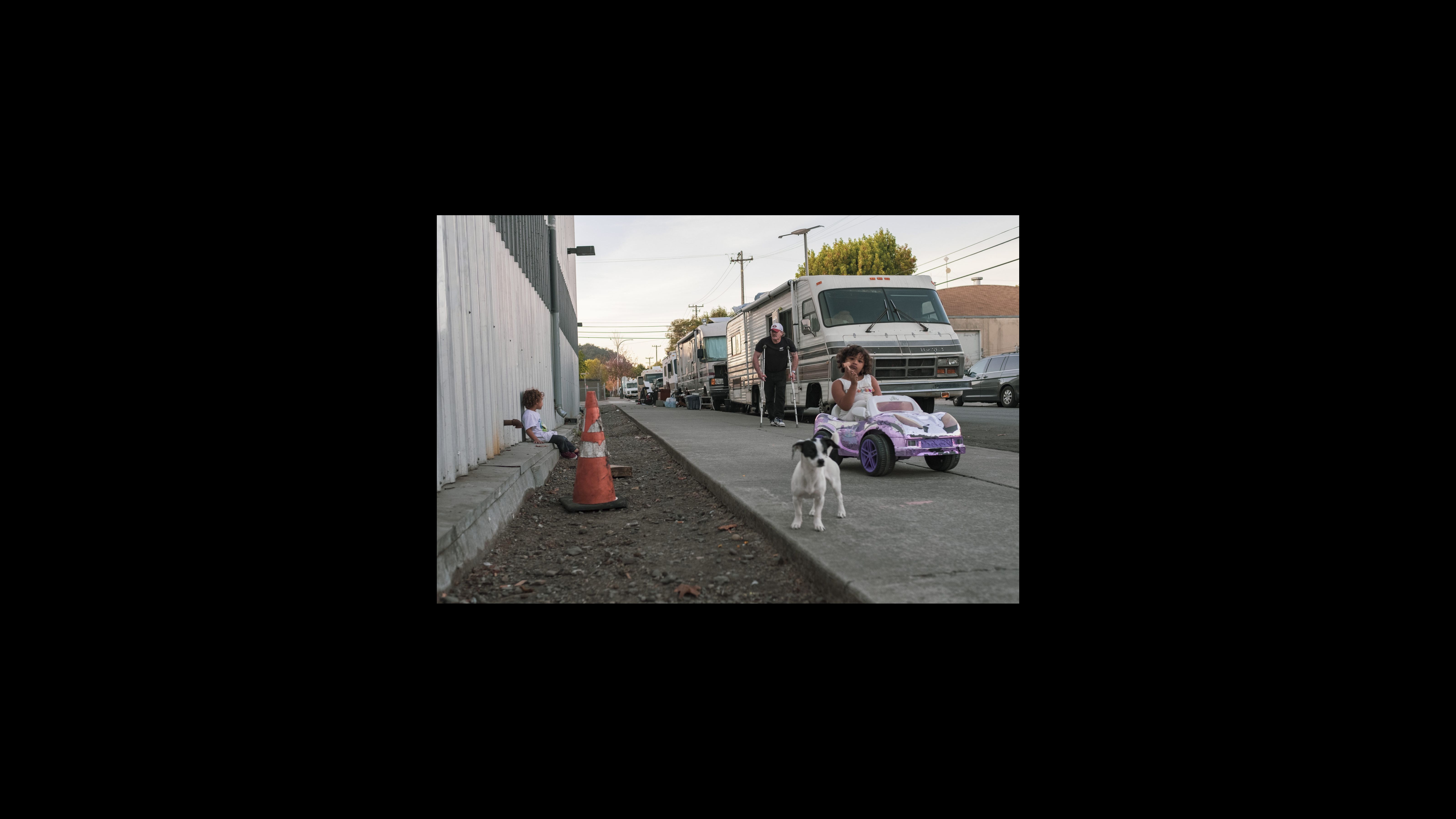 On a Sunday afternoon, children play in the Gilman District in West Berkeley. Their family is part of a community of vehicle residents called Friends on Wheels, whose members have parked and lived together for two years. The community is made up of families, students, gig workers, service workers and disabled and elderly people who live in all shapes and sizes of vehicles. On a Sunday afternoon, children play in the Gilman District in West Berkeley. Their family is part of a community of vehicle residents called Friends on Wheels, whose members have parked and lived together for two years. The community is made up of families, students, gig workers, service workers and disabled and elderly people who live in all shapes and sizes of vehicles.