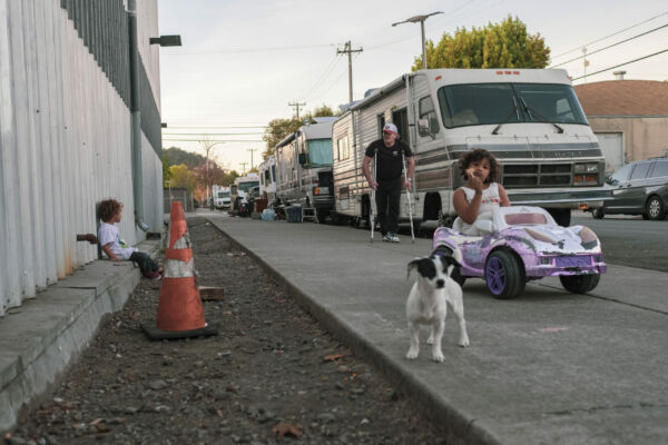 On a Sunday afternoon, children play in the Gilman District in West Berkeley. Their family is part of a community of vehicle residents called Friends on Wheels, whose members have parked and lived together for two years. The community is made up of families, students, gig workers, service workers and disabled and elderly people who live in all shapes and sizes of vehicles. On a Sunday afternoon, children play in the Gilman District in West Berkeley. Their family is part of a community of vehicle residents called Friends on Wheels, whose members have parked and lived together for two years. The community is made up of families, students, gig workers, service workers and disabled and elderly people who live in all shapes and sizes of vehicles.