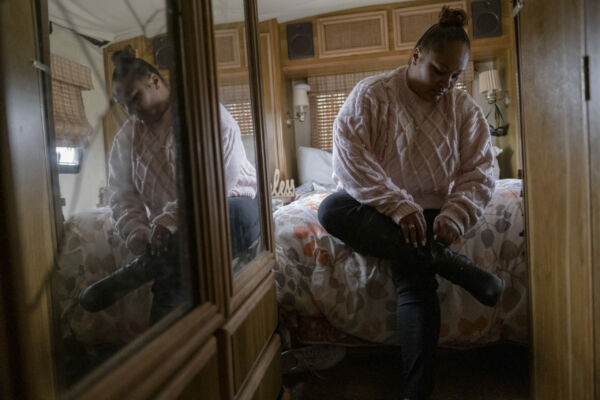 Tolbert gets dressed and does her curly hair for an afternoon work meeting. Tolbert says the RV “is a stepping stone because I want housing.” She is looking for a place costing no more than one-third of her income. Tolbert gets dressed and does her curly hair for an afternoon work meeting. Tolbert says the RV “is a stepping stone because I want housing.” She is looking for a place costing no more than one-third of her income.