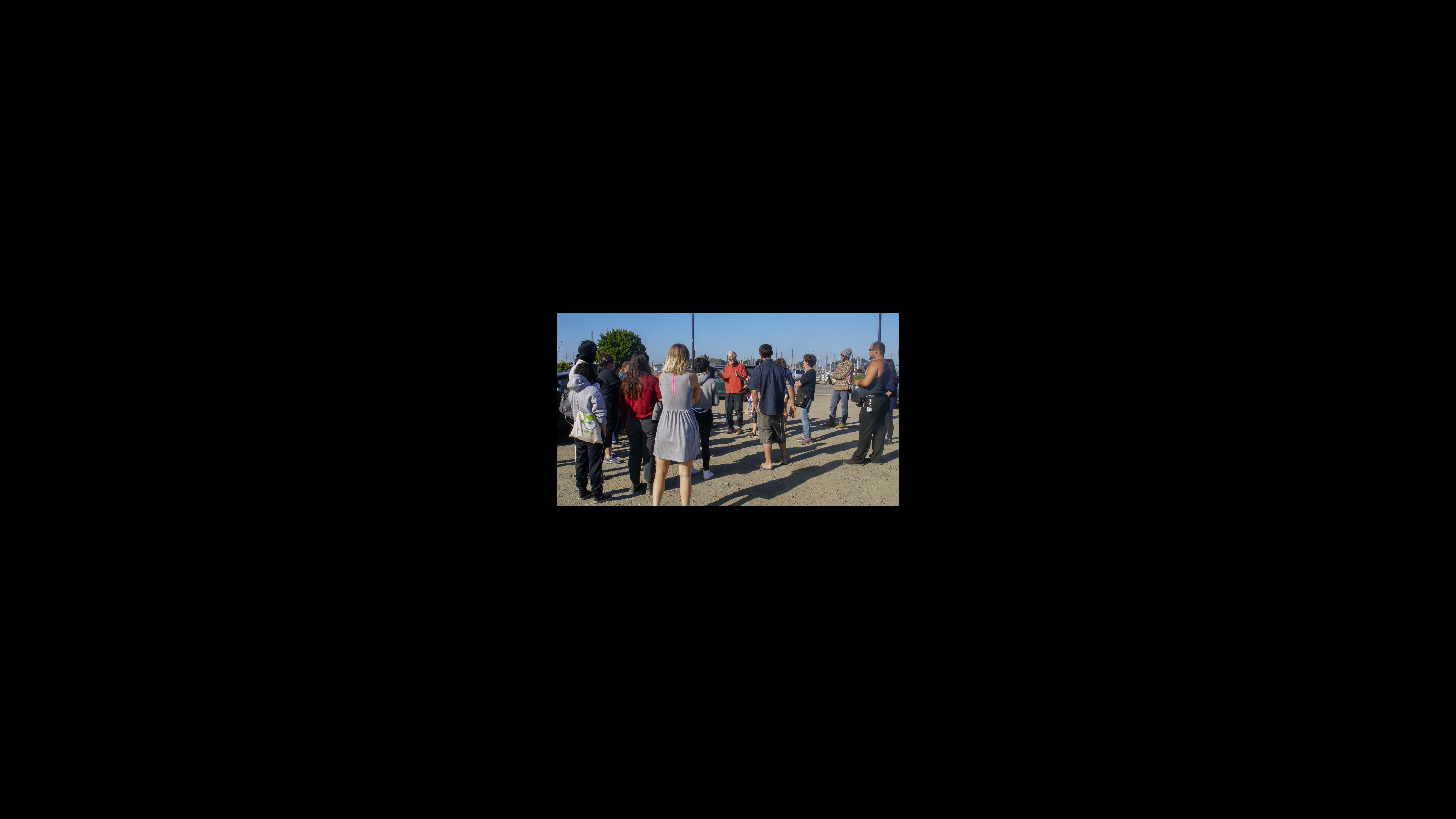 On Memorial Day in 2018, civil rights attorney Osha Neuman explains to vehicle residents at the Berkeley Marina that their efforts to negotiate for a sanctioned place to park there have failed, and they have to move or risk being towed. Waterfront staff posted construction notices on the meadow lot, forcing dozens of vehicle dwellers to relocate to other parts of the city. On Memorial Day in 2018, civil rights attorney Osha Neuman explains to vehicle residents at the Berkeley Marina that their efforts to negotiate for a sanctioned place to park there have failed, and they have to move or risk being towed. Waterfront staff posted construction notices on the meadow lot, forcing dozens of vehicle dwellers to relocate to other parts of the city.