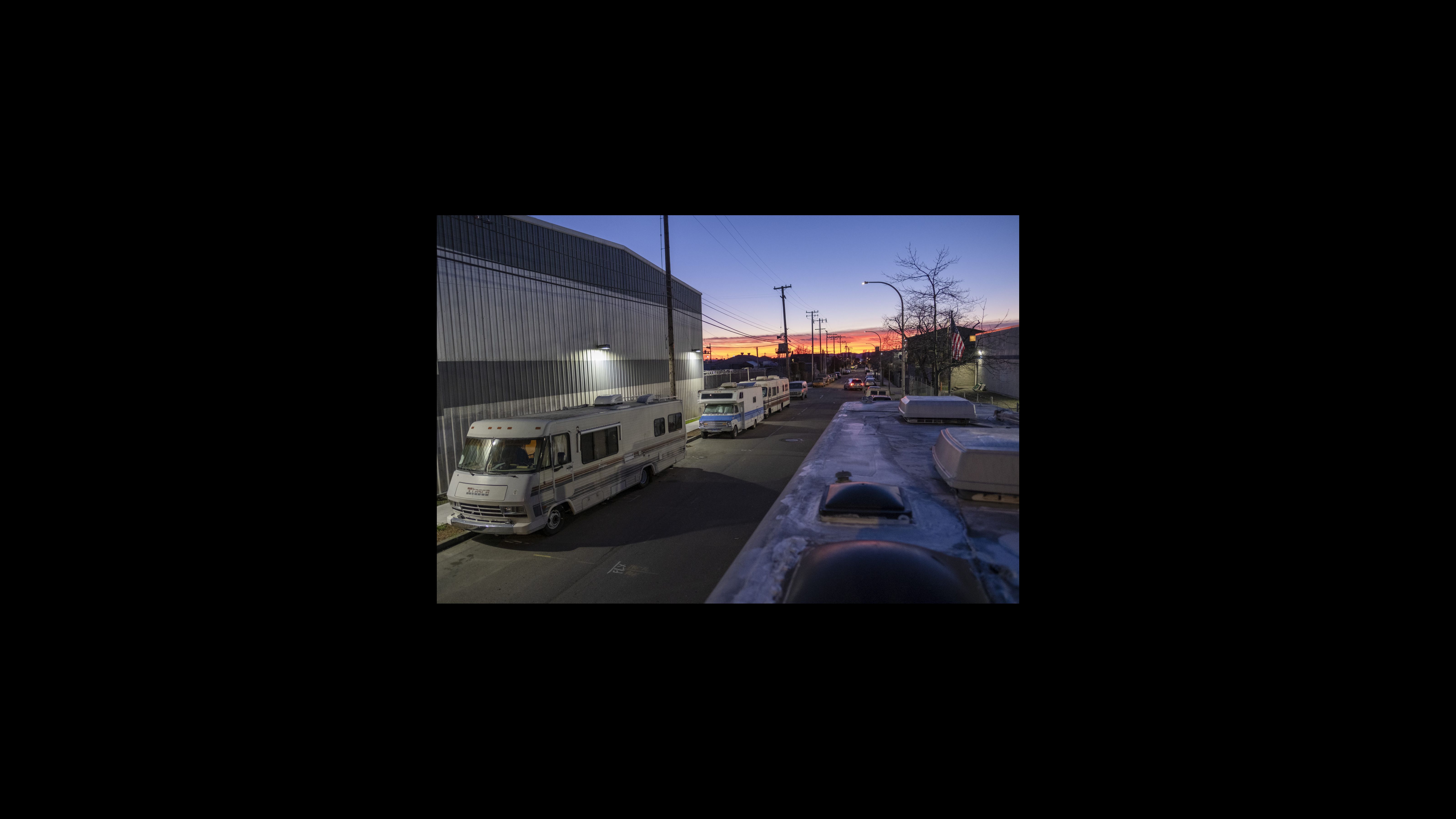 Dusk falls on seven vehicular homes at Eighth and Harrison streets in Berkeley’s Gilman District. For over a year, a vehicular community called Friends on Wheels has found refuge at this intersection, living together for safety and companionship. While searching for safe parking spots and the amenities of everyday life, vehicular residents met and banded together at the Berkeley Marina. But as the community of vehicle dwellers grew, their risk of being towed and receiving further citations forced people to leave. Vehicle residents had to find another safe place to settle, and so they found a resting spot on the industrialized streets of West Berkeley. Dusk falls on seven vehicular homes at Eighth and Harrison streets in Berkeley’s Gilman District. For over a year, a vehicular community called Friends on Wheels has found refuge at this intersection, living together for safety and companionship. While searching for safe parking spots and the amenities of everyday life, vehicular residents met and banded together at the Berkeley Marina. But as the community of vehicle dwellers grew, their risk of being towed and receiving further citations forced people to leave. Vehicle residents had to find another safe place to settle, and so they found a resting spot on the industrialized streets of West Berkeley.