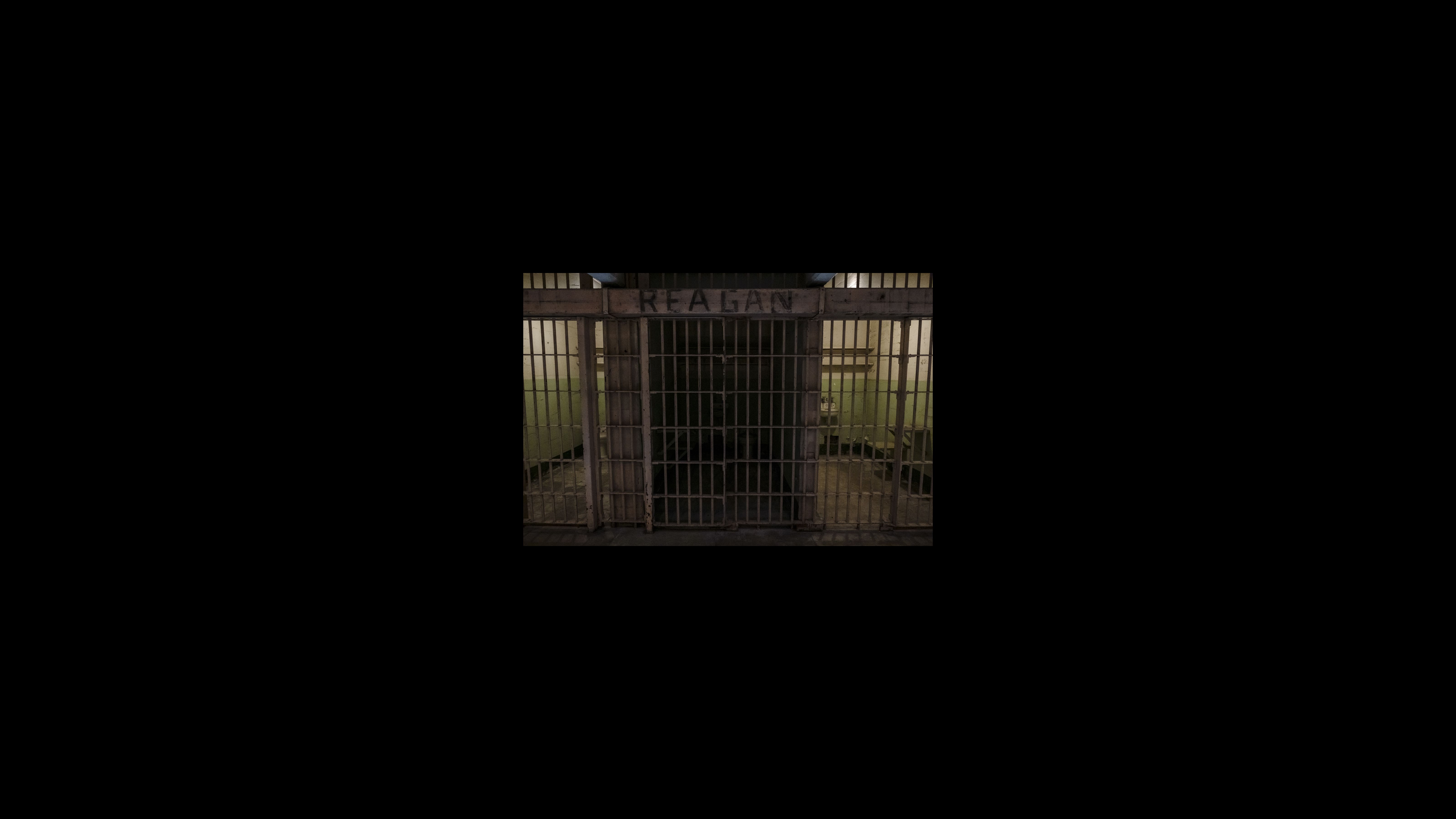 The cell house is a three-story building with four cell blocks. The D-block held prisoners in solitary confinement. Inmates were assigned individual cells that were 9 feet long, 5 feet wide and 7 feet high. The cellhouse had a corridor naming system, with hallways names after famous streets and landmarks such as Broadway, Times Square, Sunset Strip and Michigan Avenue.
While on Alcatraz, the occupiers “set aside some of the cells for political figures, including the president of the United States, Richard Nixon,” said National Park Ranger Steve Cote. “Also, they set aside a cell for governor of California, Ronald Reagan, the mayor of San Francisco, Joseph Alioto, and the electric company, PG&E.” But they changed their perspective toward Nixon. In 1970, Nixon signed legislation to stop the seizure of reservations. A cell at Alcatraz with "Reagan" painted over the cell door.