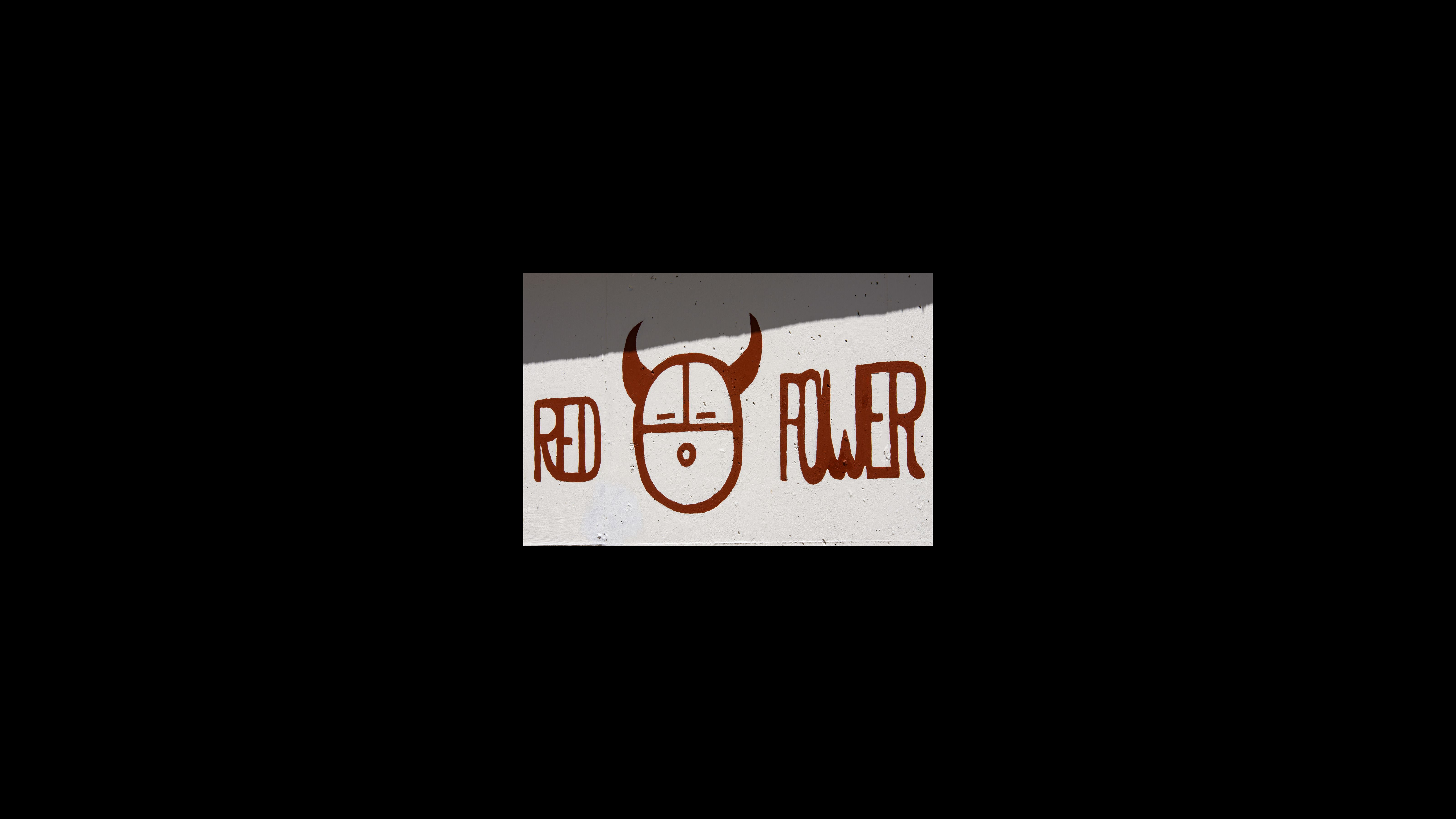 A close-up view to the “Red Power” political graffiti near Building 61. The Red Power movement remained active until 1974, and in addition to Alcatraz sparked six other occupations fighting for Native American rights across the country. These occupations were led by organizations such as the American Indian Movement and the National Indian Youth Council. A close-up view to the “Red Power” political graffiti near Building 61.
